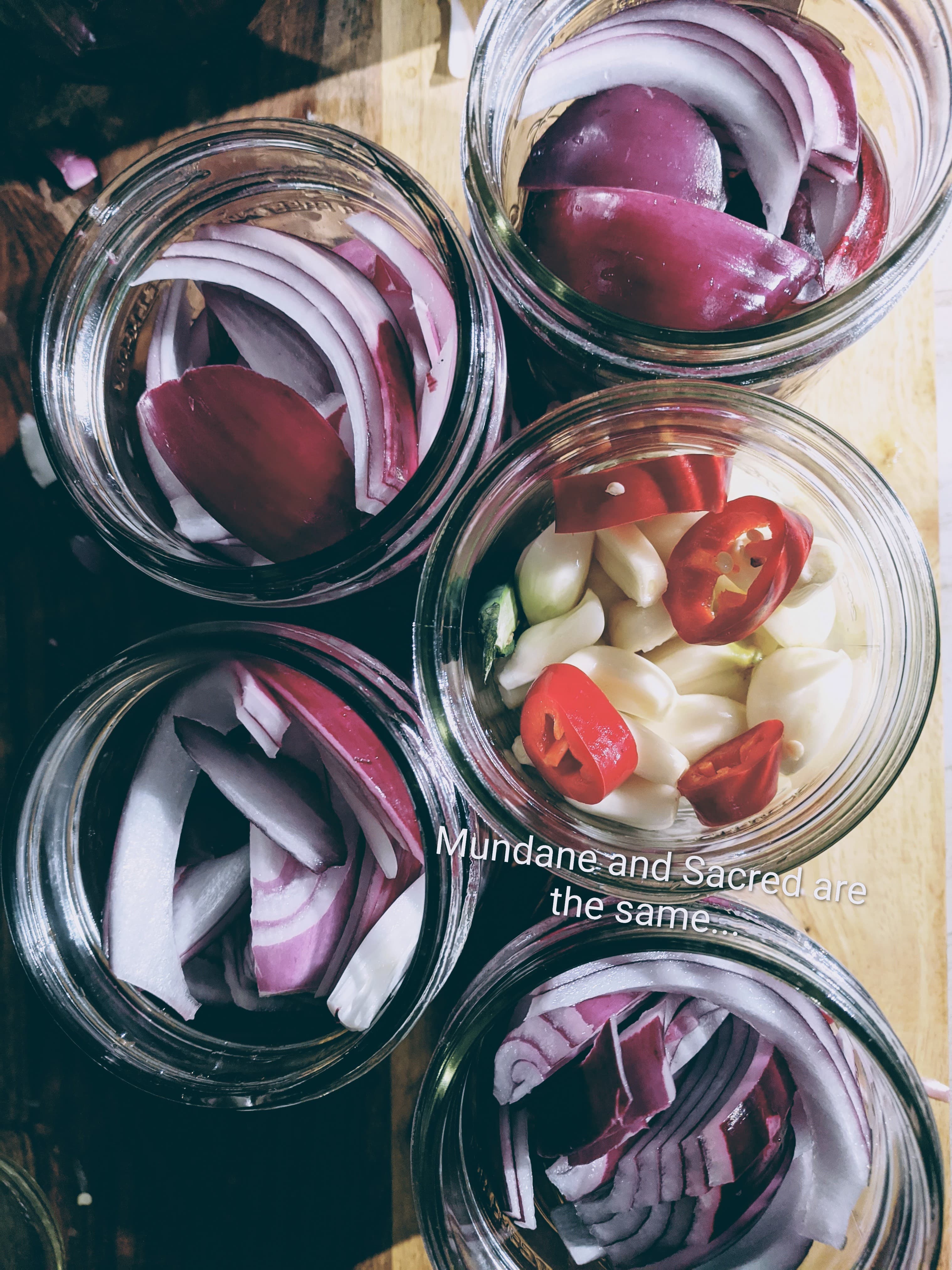 Overhead shot of onion and garlic jars